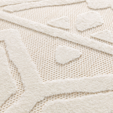 Texture du tapis extérieur et intérieur Brasilia crème, avec tissage plat et détails ethniques