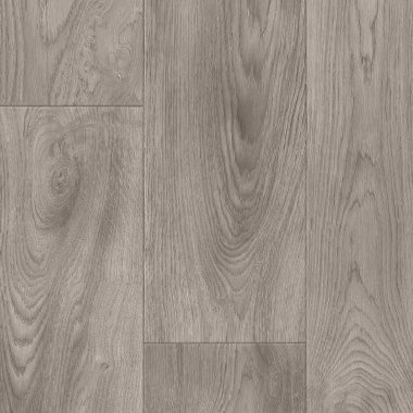 Sol vinyle Prestige Batitec - Burned Wood T94, détail du décor bois gris patiné avec veinures apparentes et lames décalées
