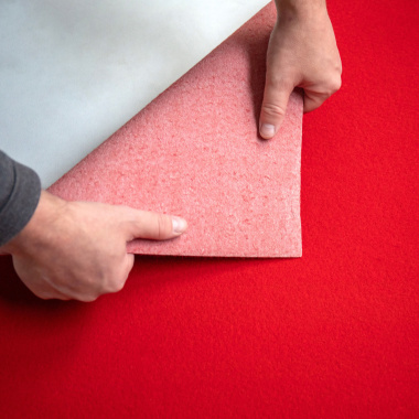 Sol textile événementiel Stand Event Rouge vif avec moquette retournée montrant l’envers