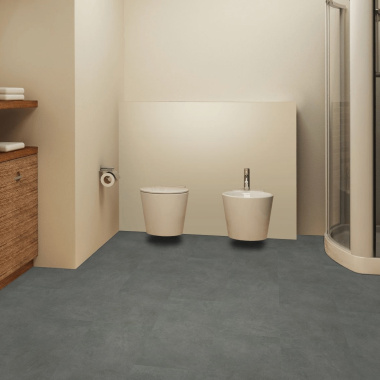 Dalles PVC - Click à plat 0,55 - effet béton gris foncé dans une pièce humide