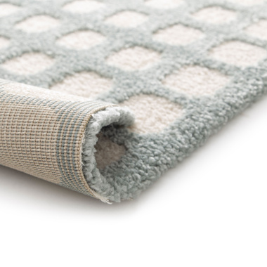 Vue sur la structure moelleuse et douce du tapis en relief Art Abstrait - Bleu ciel