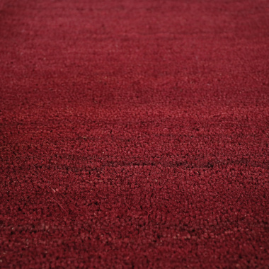 Vue sur la texture du tapis sur mesure paillasson brosse coco 23 mm rouge, parfait pour un seuil d’entrée