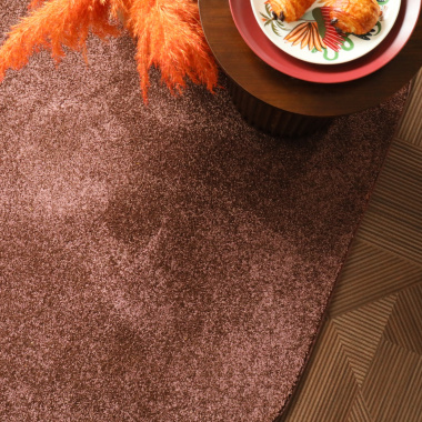 Tapis ovale Lumicolor marron auburn - vue de haut