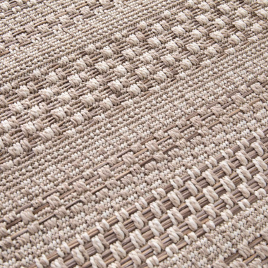 Texture du tapis Indy grège, alternance de tissages fins et épais