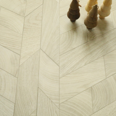 Sol biocirculaire Lamelles de bois avec motif chevrons et jouets en bois