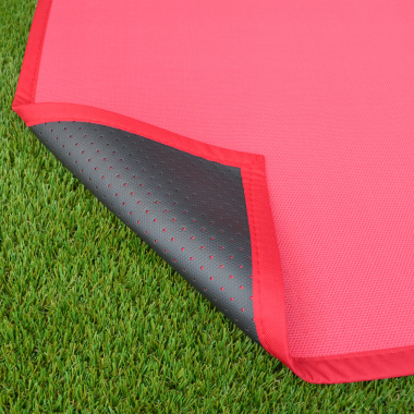 Envers avec dossier anti-dérapant du Tapis PVC tressé - Rose Corail présenté en extérieur