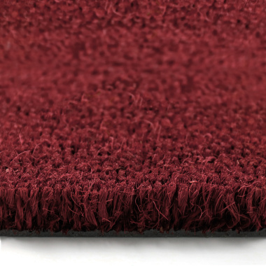 Zoom sur les brins de coco filés à la main du tapis sur mesure paillasson brosse coco 17 mm rouge