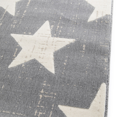 Bordure du tapis enfant Star Vintage avec motif étoile blanche sur fond gris foncé