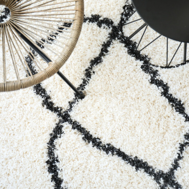 Tapis de salon à poils longs Art Abstrait noir et blanc cassé - vue de haut