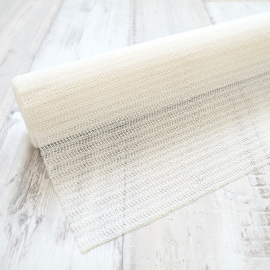 Sous tapis anti-glisse adaptable, structure légère pour maintien et stabilité du tapis au sol