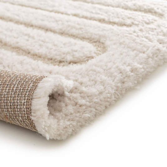 Épais tapis en relief Zig-Zag crème vue de l'envers à la finition soignée