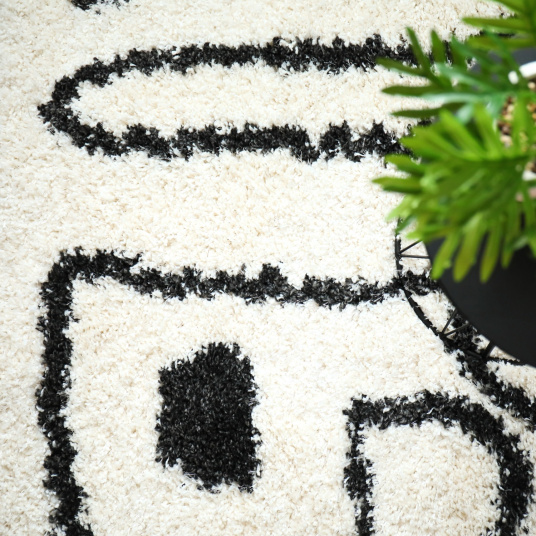 Tapis de salon à poils longs - Line art - Noir et blanc cassé - Vue de haut