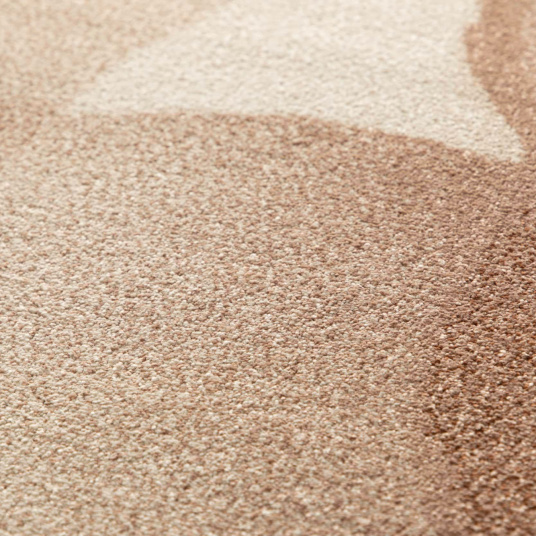 Gros plan tapis Élégie motif aquarelle dégradé marron beige bleu