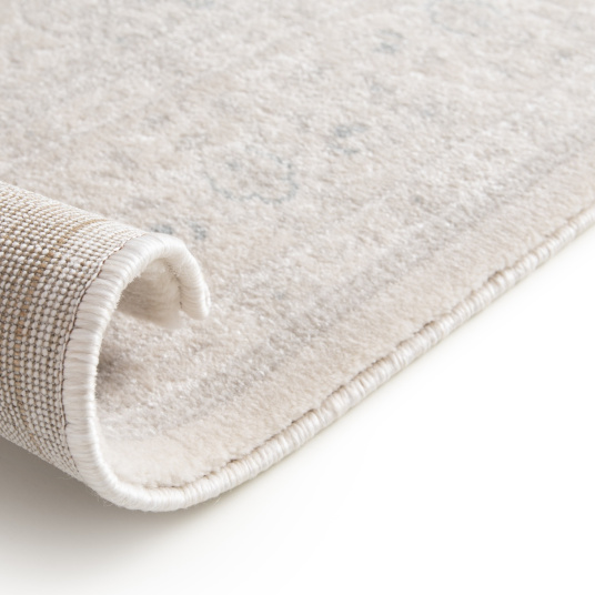 Tapis à motif floral oriental Médina écru - envers