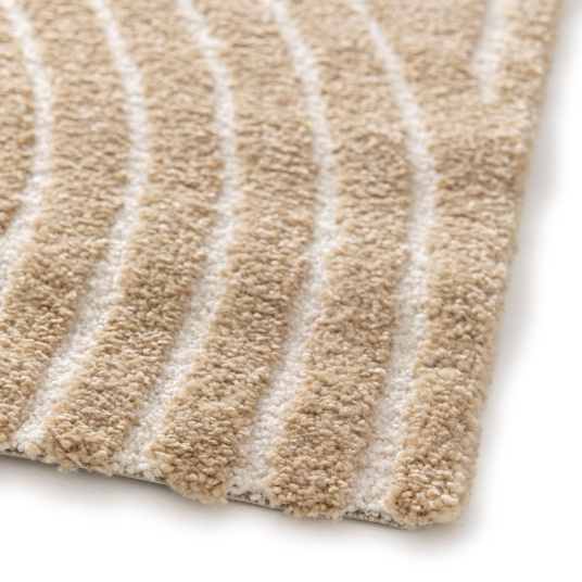 Vue détaillée des bords du tapis de salon en relief - Circle - Courbe beige et crème