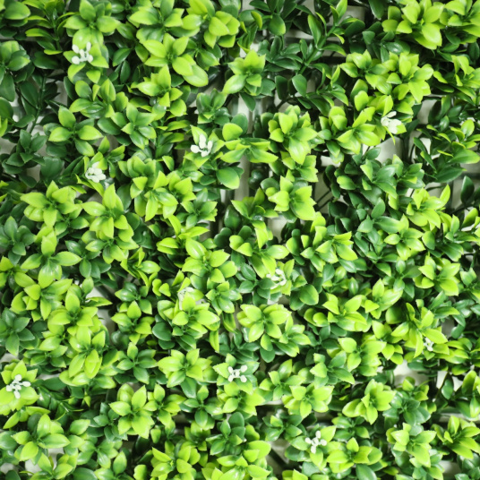 Détail du feuillage du mur végétal artificiel Jasmin blanc, effet naturel pour intérieur/extérieur