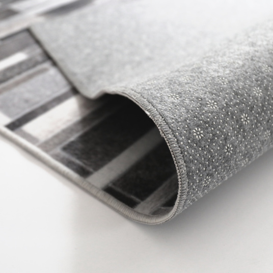 Tapis toucher soft - Imprimé peau de vache - Parement gris - envers