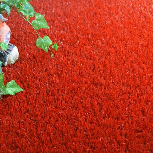 Gazon synthétique Expo rouge 22 mm certifié GRS, texture dense et colorée