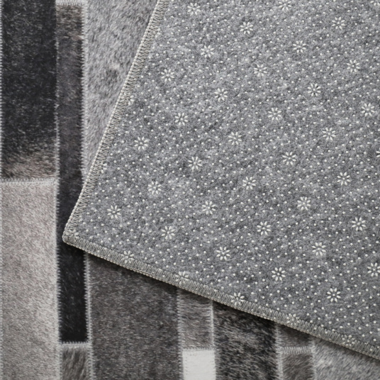 Tapis toucher soft - Imprimé peau de vache - Parement gris - tranche