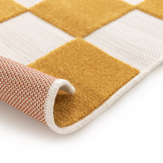 Tapis extérieur et intérieur Marius jaune moutarde, bordure roulée et motif graphique