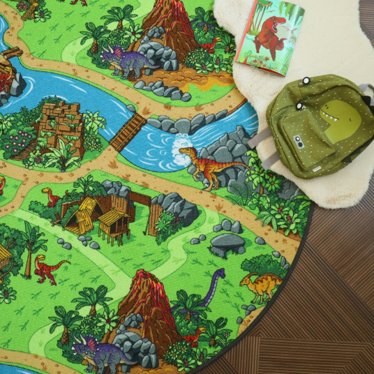 Tapis rond de jeu enfant circuit volcans et dinosaures - vue de haut