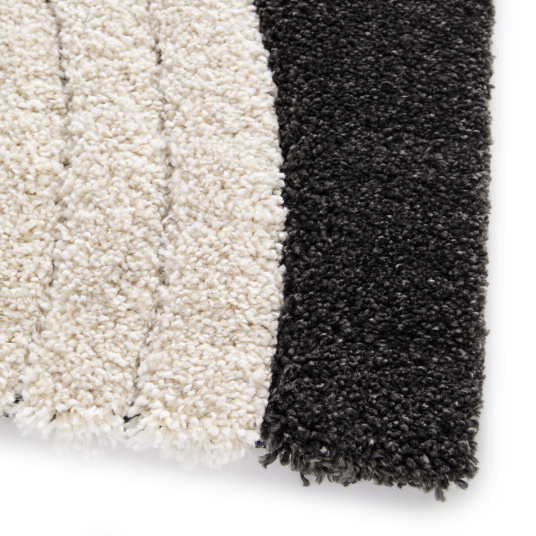 Tapis de salon en relief Modern Circle noir et crème - coin