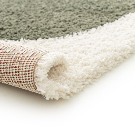 Finition et envers du Tapis style berbère Terre ancestrale vert kaki, terracotta