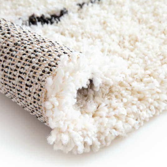 Tapis motif berbère à poils longs - Itahari - Noir et blanc cassé - Tapis et envers