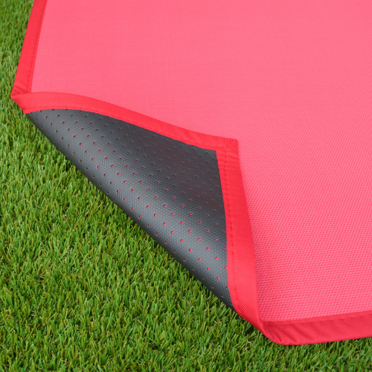 Envers avec dossier anti-dérapant du Tapis PVC tressé - Rose Corail présenté en extérieur