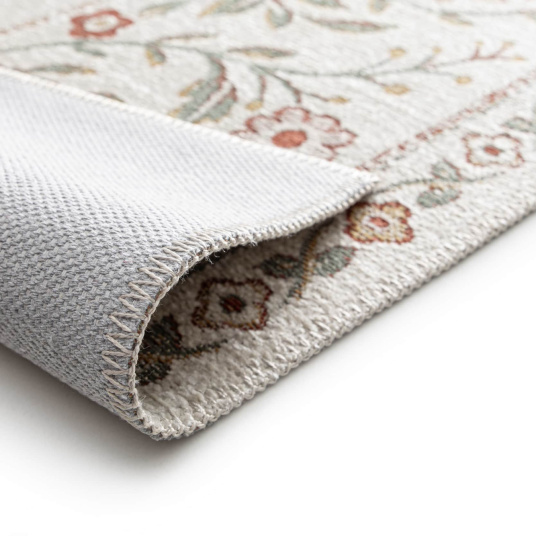 Envers du tapis souple Minia Pêche en chenille recyclée – détail finition