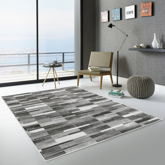 Tapis toucher soft - Imprimé peau de vache - Parement gris - Ambiance Salon