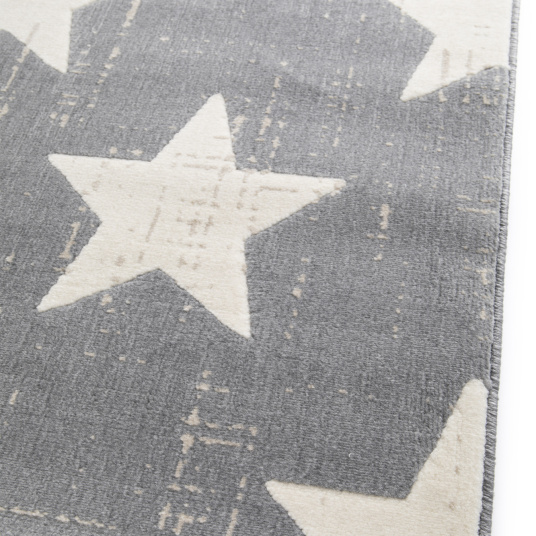 Bordure du tapis enfant Star Vintage avec motif étoile blanche sur fond gris foncé