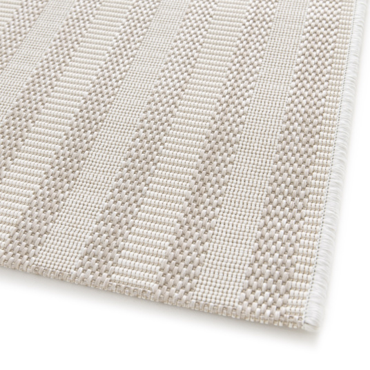 Texture du tapis Graphic Line beige, matière recyclée et design contemporain