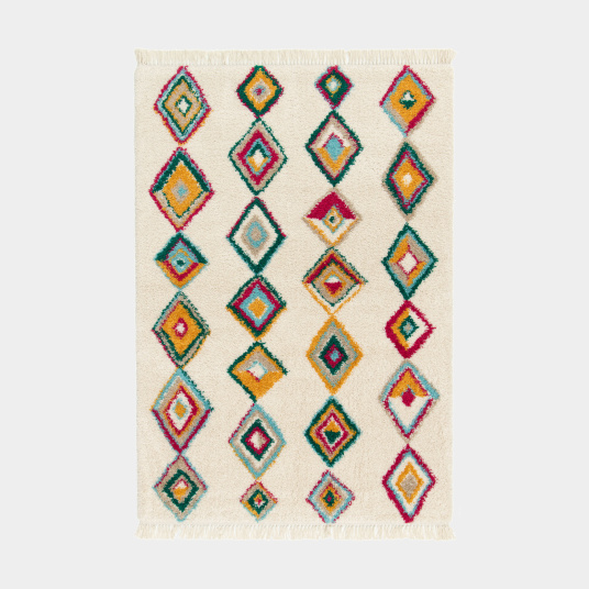 Présentation du tapis à motif berbère Héritage du désert multicolore à franges, inspiration nomade et géométrique