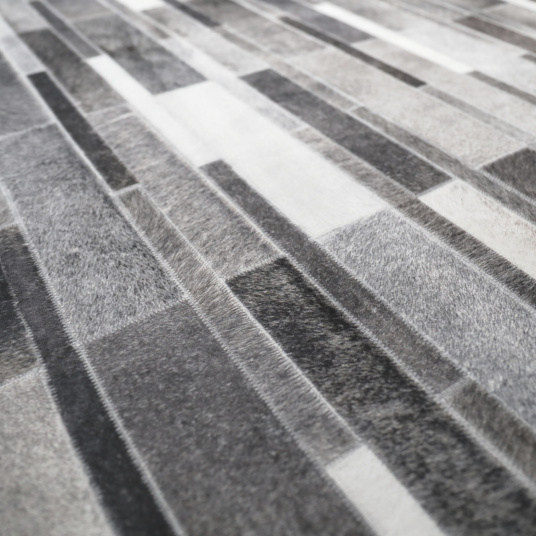 Tapis toucher soft - Imprimé peau de vache - Parement gris - gros plan