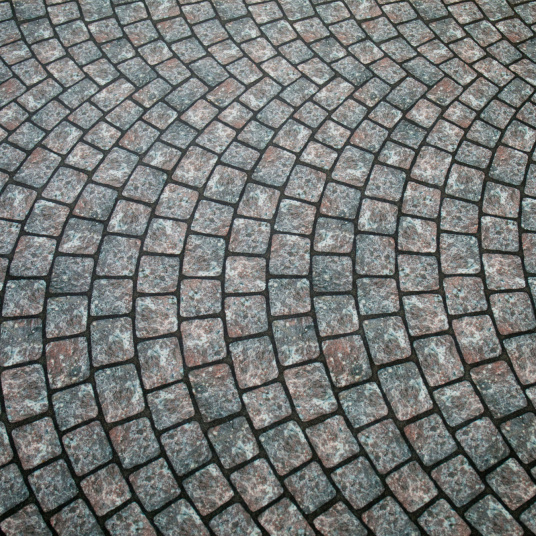 Moquette Stand imprimée Pavés à la Parisienne motif pavés arrondis tons gris