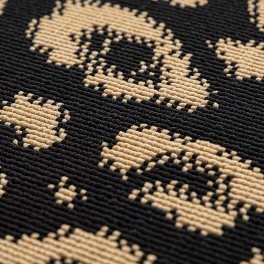 Texture du tapis léopard noir et doré – relief graphique chic et contemporain