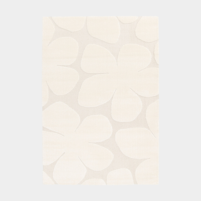 Tapis de salon en relief Flower Power motif fleurs crème vu de dessus, design épuré et texture douce
