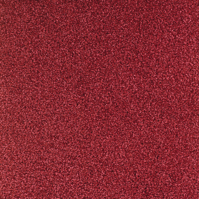 Gros plan sur la surface du tapis velours rouge passion Feelings, montrant un toucher moelleux et une matière textile raffinée