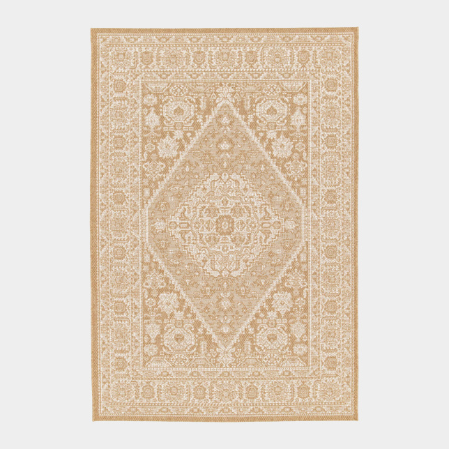 Design oriental revisité pour le tapis Naya en coloris naturel et blanc