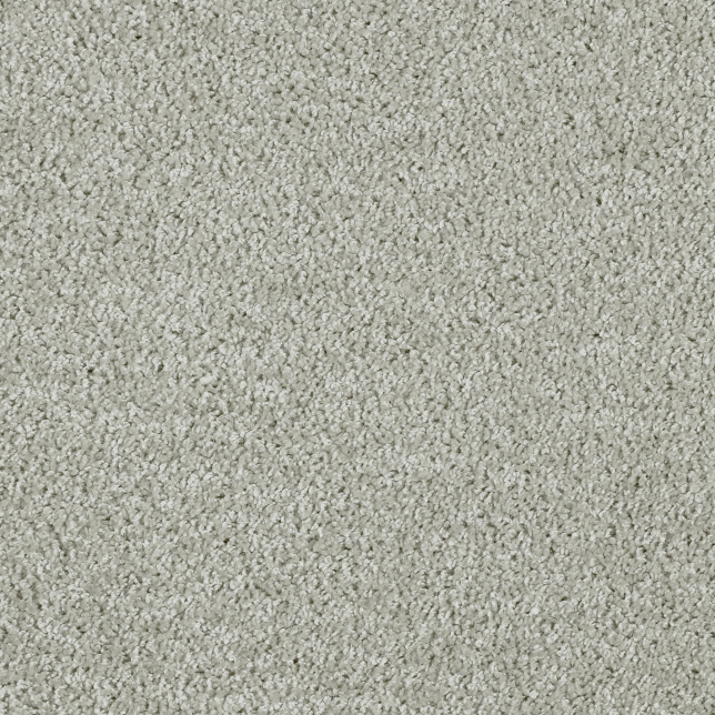 Gros plan sur la moquette Lumicolor gris clair, idéale pour un intérieur cosy