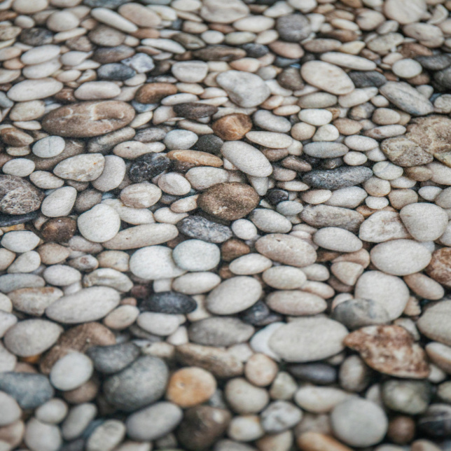 Moquette Stand imprimée Galets – texture minérale réaliste pour scénographie design