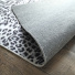 Tapis toucher soft - Imprim lopard - Patchwork noir et blanc - coin