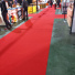 Revêtement de sol Stand Expo rouge vif, moquette fine et pratique pour aménagement événementiel