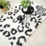 Tapis salon  poils longs - Wild animal noir et blanc cass - vue de loin