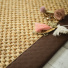 Tapis sisal naturel grosses boucles finition marron - gros plan