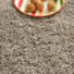 Tapis rond Icone shaggy marron galon couleur lin - gros plan