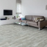 Sol Vinyle First - Imitation parquet gris clair - Effet argent - Salon