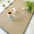 Tapis jonc de mer Bihar fin chevron finition vert mousse - salon