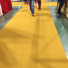 Moquette Orotex Revexpo jaune, sol de salon chaleureux et accueillant